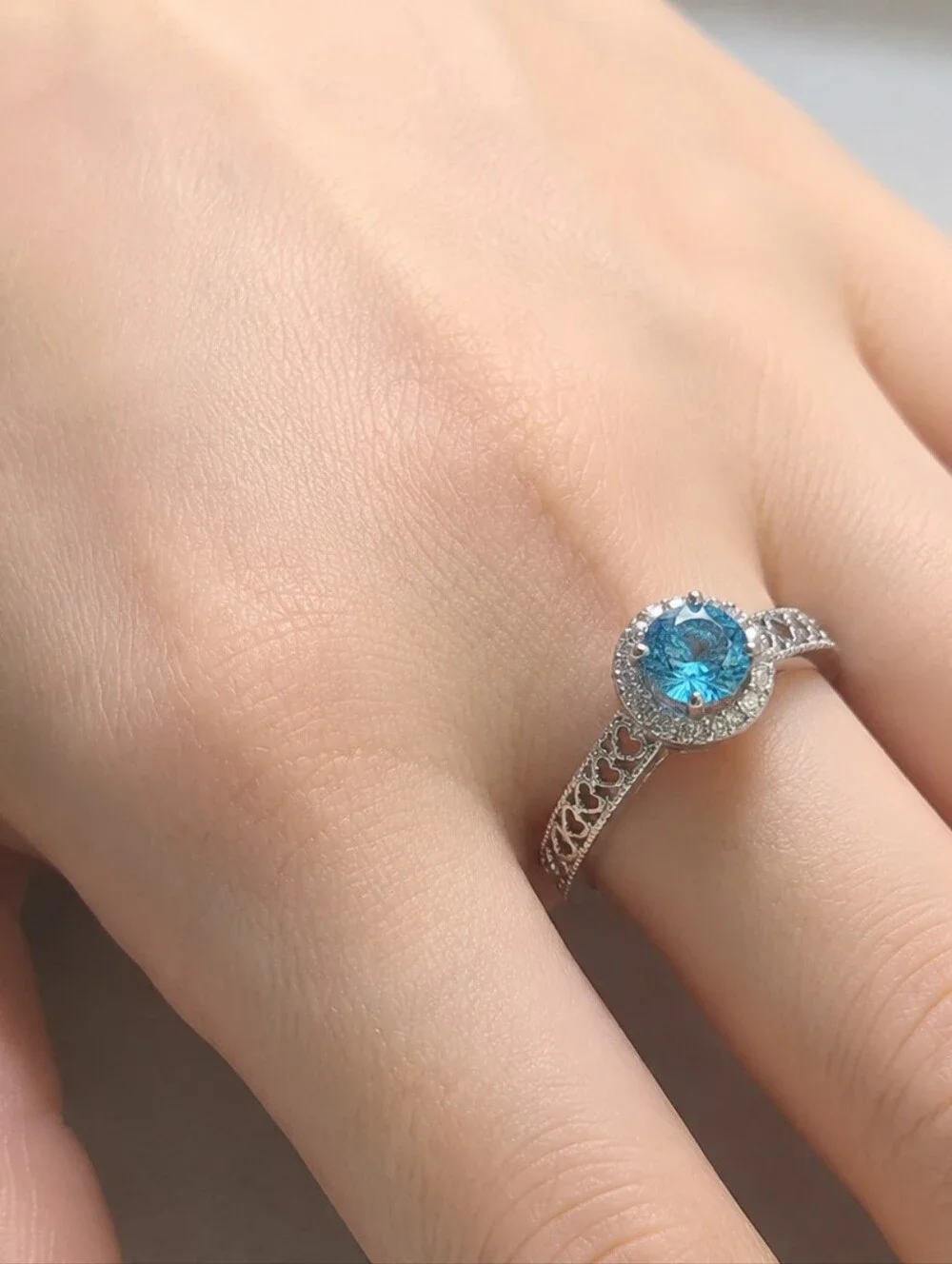 Silver Halo Ring with Blue Center Stone